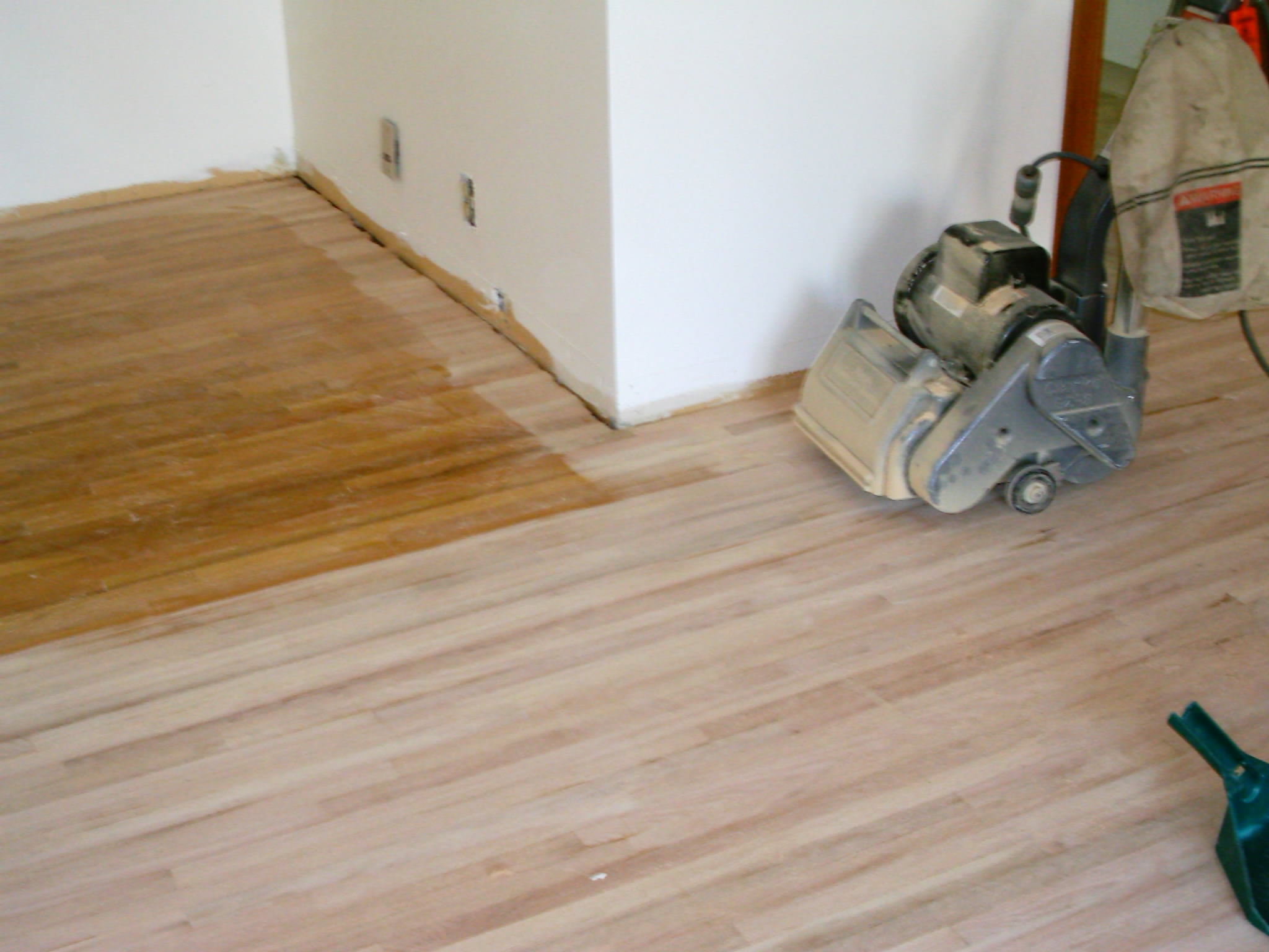 How do you sand a hardwood floor?
